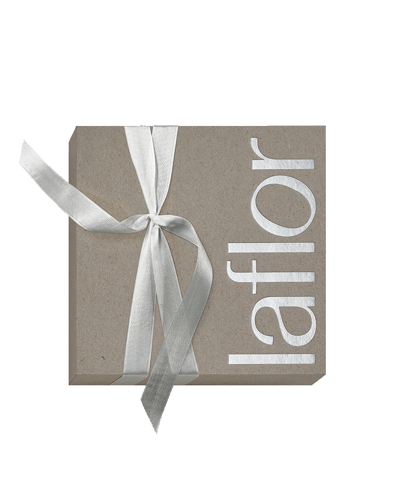 Closed, elegant grey gift box from laflor with silver logo